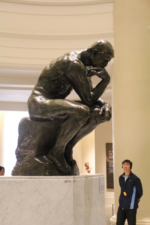 The famous Thinker statue on display in the Rodin exhibit gallery.